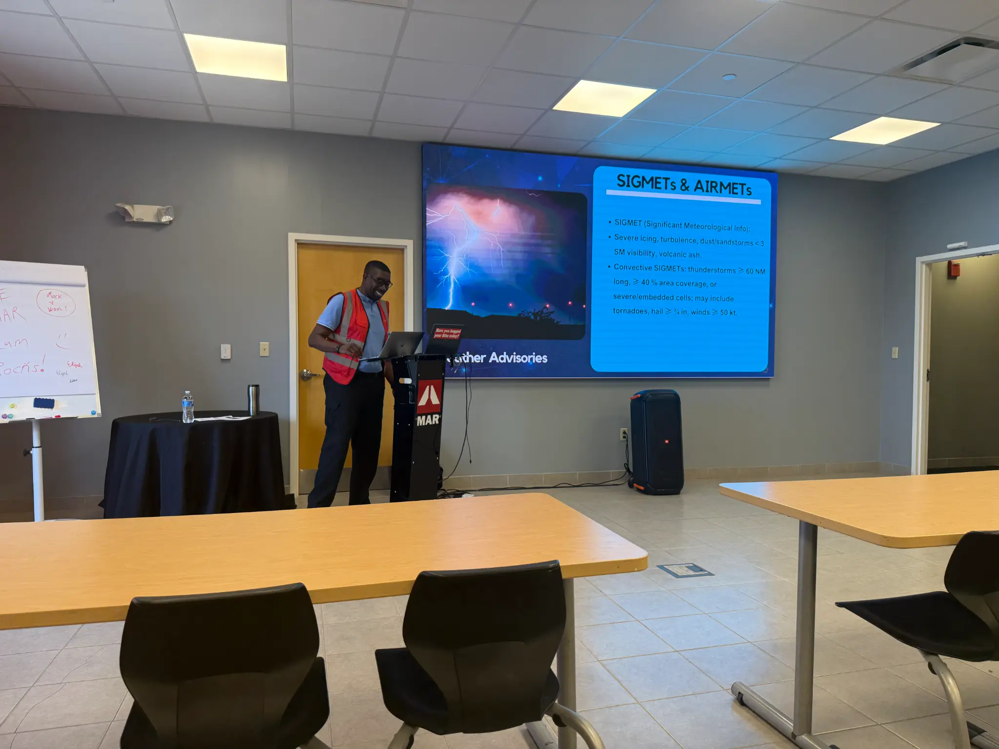 Ivory Cooper leading classroom instruction in the Byhalia training environment